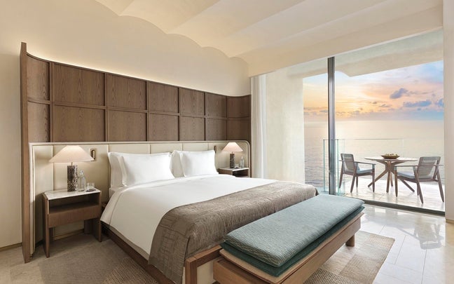 A guest bedroom at Six Senses Dubai The Palm